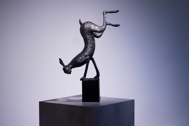 Petite sculpture en bronze représentation d'un trait humoristique.